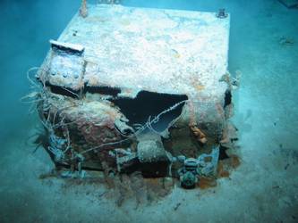 Rectangular tank or locker on seabed